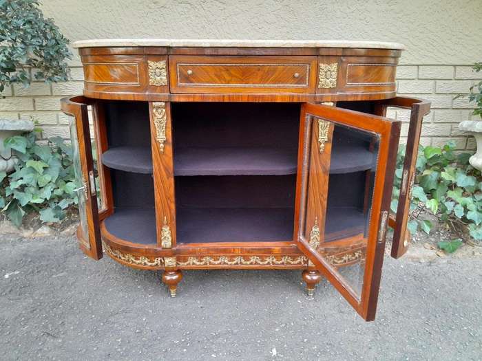 A 20TH Century French Louis XVI Style Rosewood Buffet / Credenza / Drinks Table With Cream Stone Top