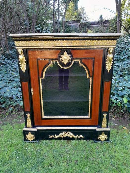 A 20th Century French Style Mahogany And Ebonised Pier Cabinet With Marble Top And Brass Hardware...