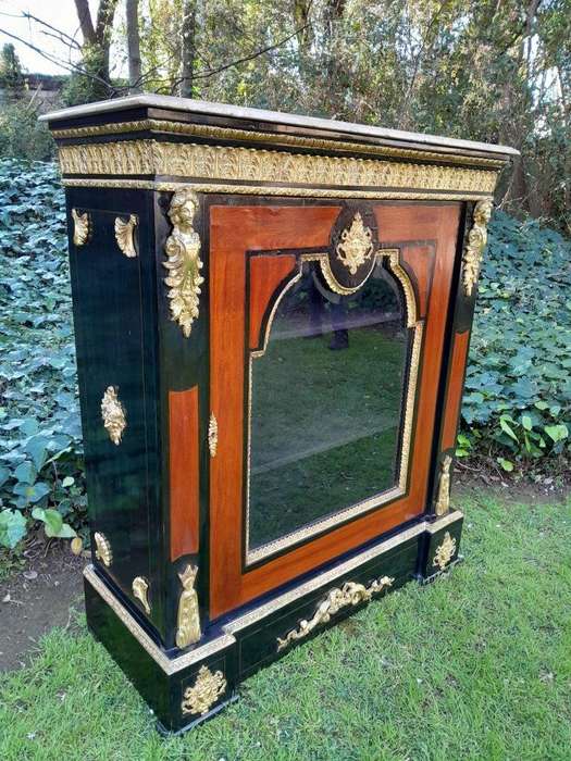 A 20th Century French Style Mahogany And Ebonised Pier Cabinet With Marble Top And Brass Hardware...
