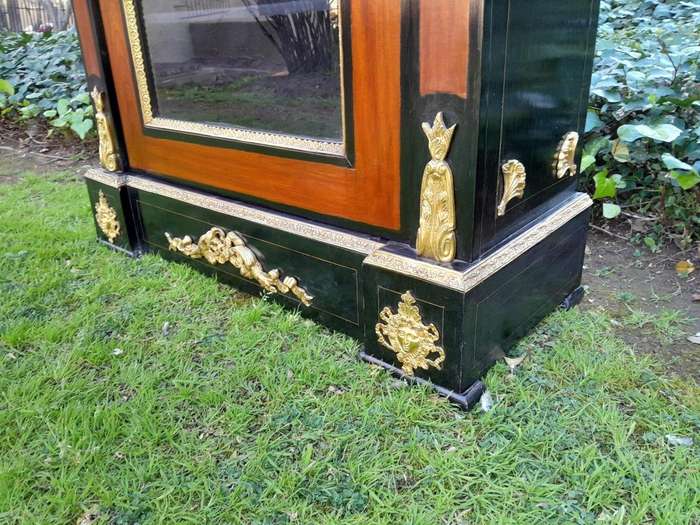 A 20th Century French Style Mahogany And Ebonised Pier Cabinet With Marble Top And Brass Hardware...