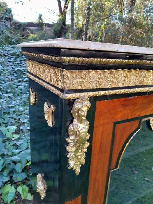 A 20th Century French Style Mahogany And Ebonised Pier Cabinet With Marble Top And Brass Hardware...