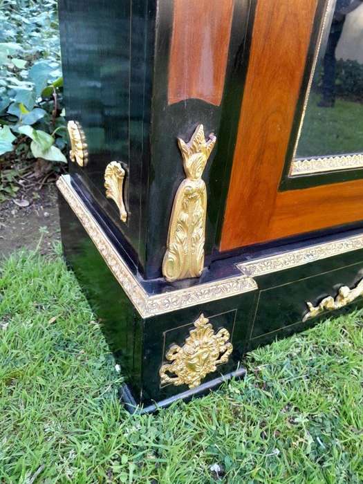 A 20th Century French Style Mahogany And Ebonised Pier Cabinet With Marble Top And Brass Hardware...