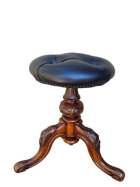 An Antique Circa 1870s Victorian Carved Walnut  Piano Stool Upholstered In Leather