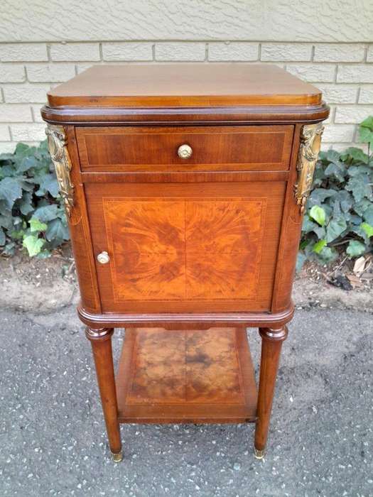 A 19th Century French Inlaid Wooden Bedside Pedestal With Brass Mounts, With Drawer