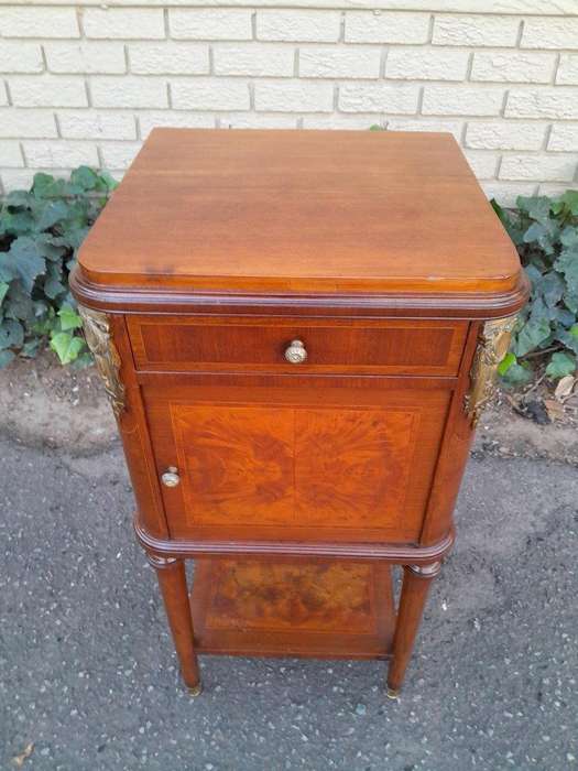 A 19th Century French Inlaid Wooden Bedside Pedestal With Brass Mounts, With Drawer