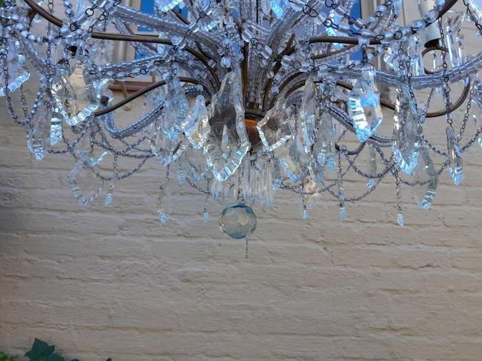 A 20th Century French Style Crystal Chandelier With Twelve Lights