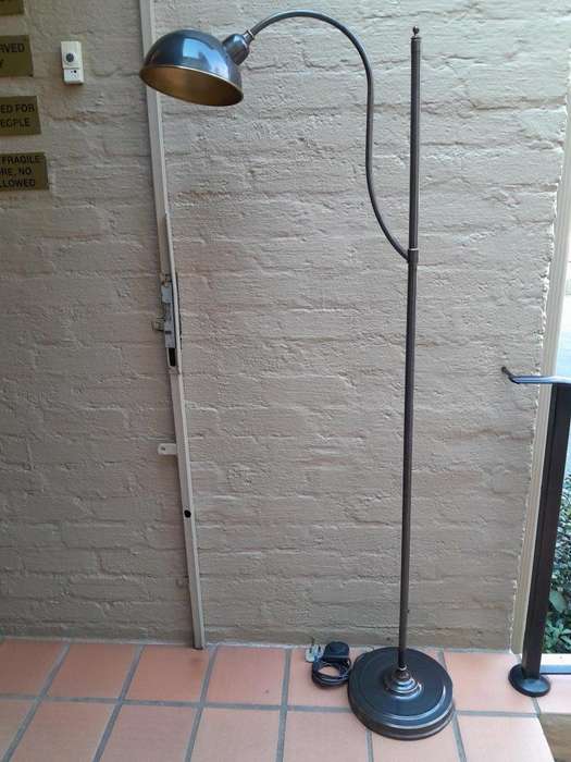 A Contemporary Grey And Gilt Metal Floor Lamp