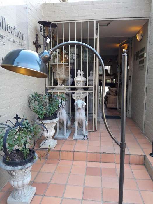 A Contemporary Grey And Gilt Metal Floor Lamp