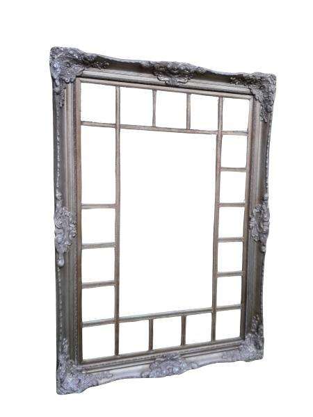 A 20th Century French Style Ornately Carved, Gilt Painted And Bevelled Mirror
