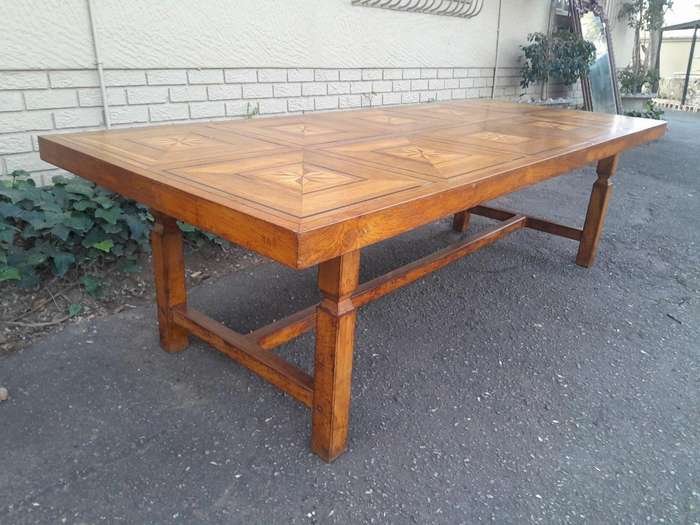 An Antique 19th Century French Oak And Walnut Table With Inlaid Parquetry Top