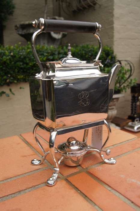 A 20TH Century Silver-Plate Kettle on Stand with Burner