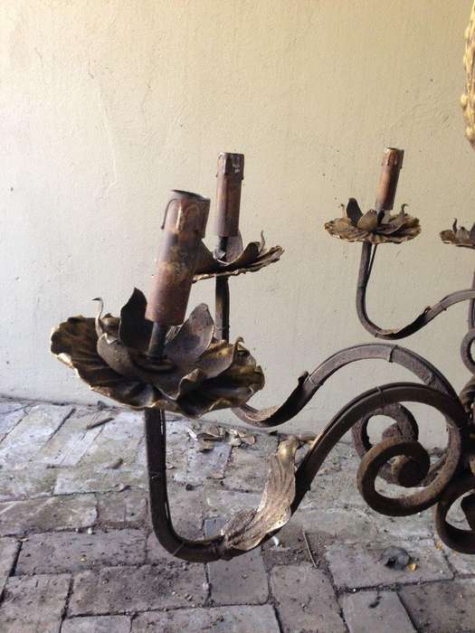 A Large Wrought Iron and Hand-Painted Imported Chandelier with Crown Detail
