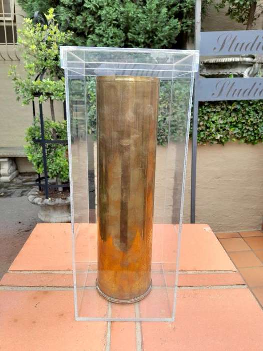 A 20TH Century Brass Cannon Shell In A Custom-Made Display Perspex Box
