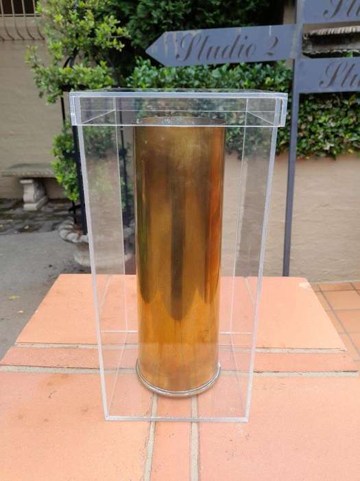A 20TH Century Brass Cannon Shell In A Custom-Made Display Perspex Box