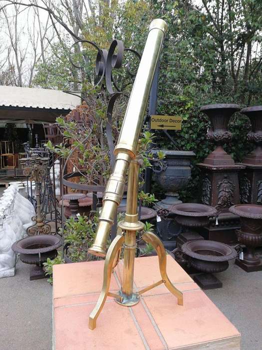 An Antique Brass Floor Standing Telescope On Tripod With Lens Cover