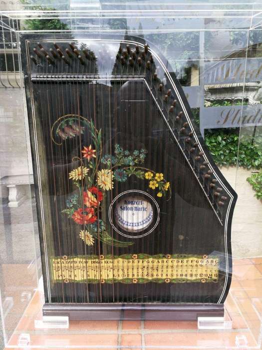 A 20th Century Alpine Zither By Konzert Salon-Harfe Housed In A Perspex Box