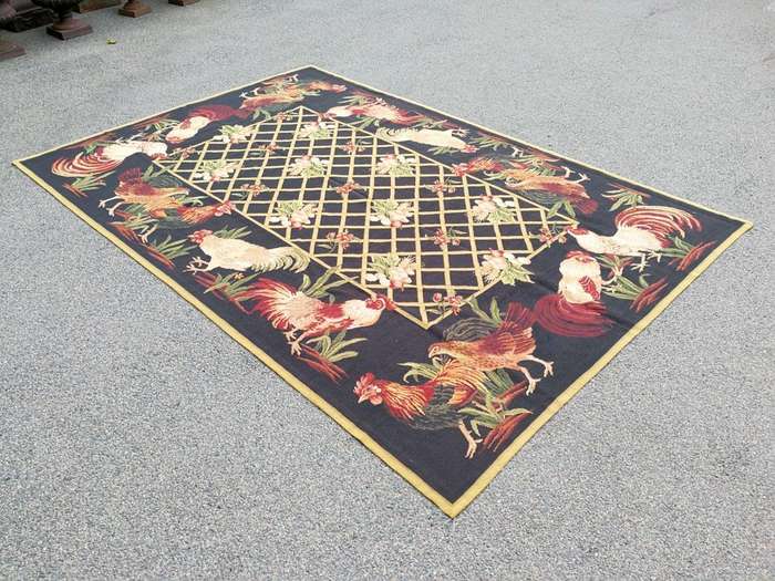 A Needlepoint Woven Carpet