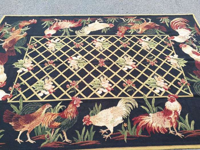 A Needlepoint Woven Carpet
