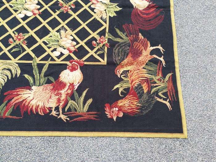A Needlepoint Woven Carpet