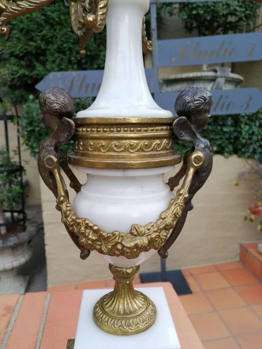 An Antique Circa Early 1900 Brass Garniture Clock Set with Key. Comprising a Clock and Pair of Ca...