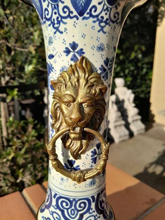 A 20th Century Dutch Delft Porcelain And Brass Candelabra