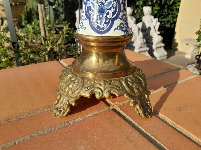 A 20th Century Dutch Delft Porcelain And Brass Candelabra