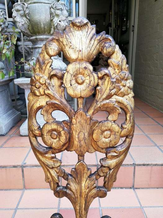 An Early 20TH Century Pair Of Gilt-Wood Carved Decorative Objects