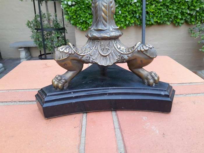 A 19th Century French Bronze And Granite Candelabra