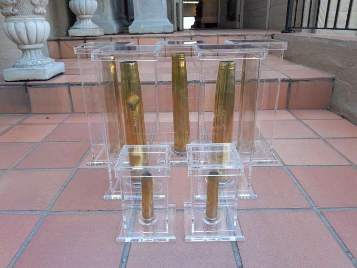 A Mid-20th Century Circa 1945 Set of Seven WW2 Brass Cannon Shells In Perspex Boxes