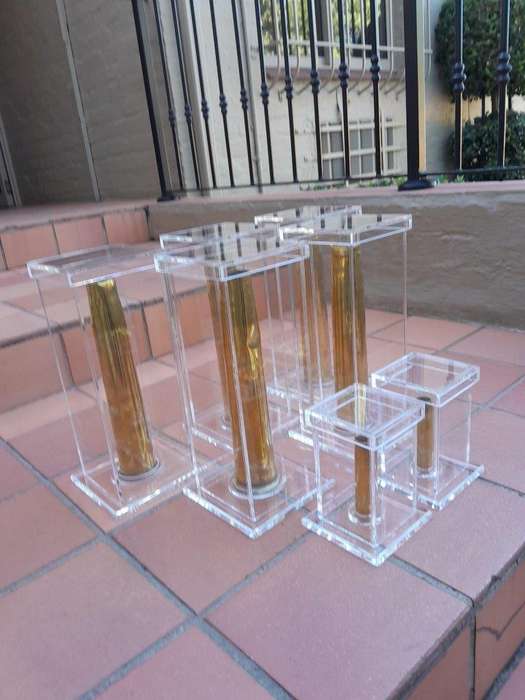 A Mid-20th Century Circa 1945 Set of Seven WW2 Brass Cannon Shells In Perspex Boxes