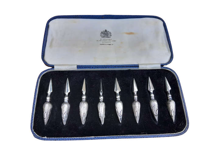 An Early 20th Century Mappin and Webb Cased Set of Eight Silver Plate Corn Holders