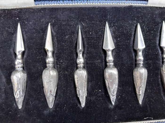 An Early 20th Century Mappin and Webb Cased Set of Eight Silver Plate Corn Holders