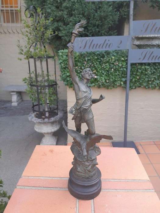 An Early 20th Century French Patinated Spelter Figurine on Wooden Base