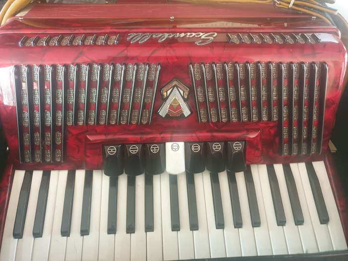 Accordian, Scandalli  96 bass in case with old music sheets