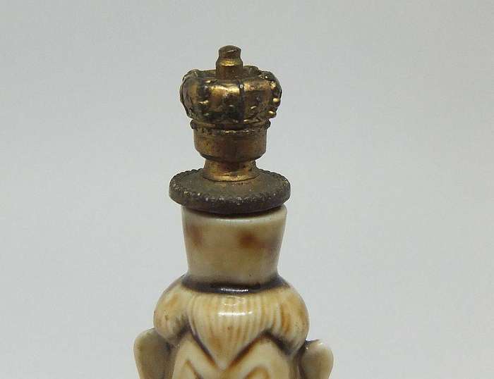 An extremely rare 1920`s German figural perfume bottle with crown top by Schafer & Vater