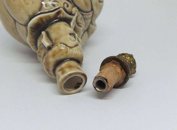 An extremely rare 1920`s German figural perfume bottle with crown top by Schafer & Vater