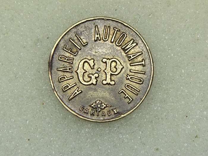 AN OLD 20 CENTIMES FRENCH CONSUMER TOKEN