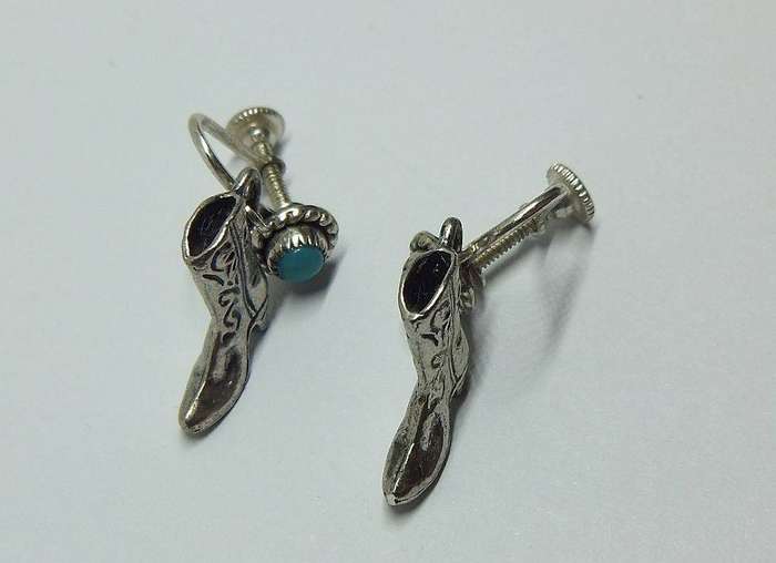 A unique pair of vintage sterling silver earrings with cabochon Turquoise and cowgirl booties