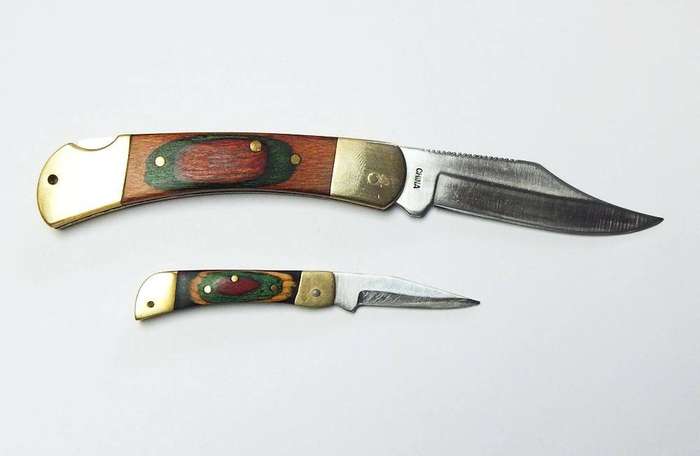 Two vintage heavy quality brass and wood lock blade folding pocket knives