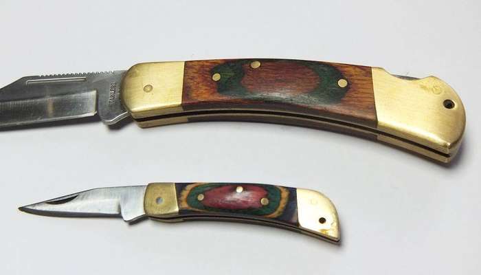 Two vintage heavy quality brass and wood lock blade folding pocket knives