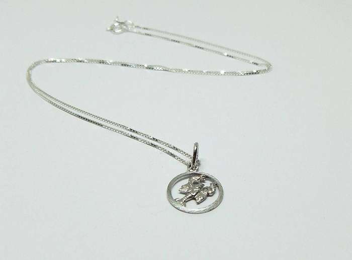 A vintage German 800 silver Cancer Zodiac sign pendant plus a sterling silver necklace