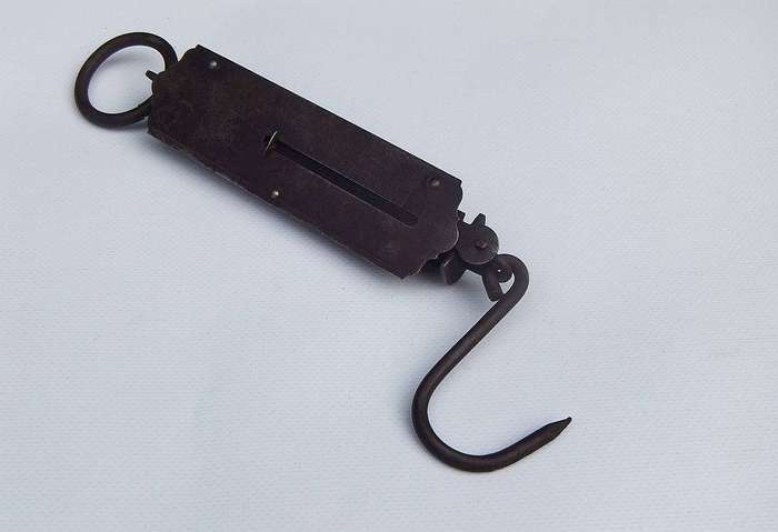 An old pocket balance scale made in Germany