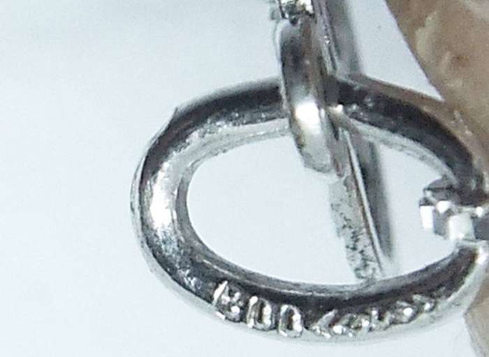 A vintage German 800 silver Cancer Zodiac sign pendant plus a sterling silver necklace