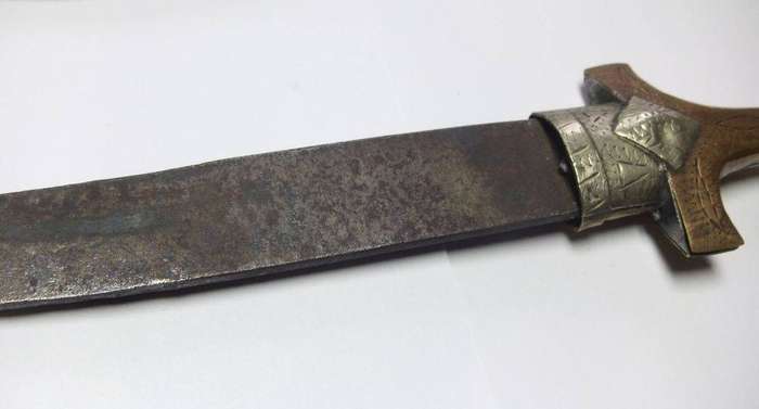 A large vintage Turkish dagger with detailed sheath in display condition