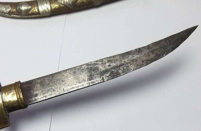 A large vintage Turkish dagger with detailed sheath in display condition