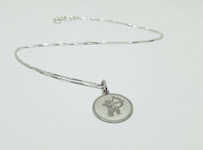 A vintage sterling silver Sagittarius Zodiac sign pendant with a sterling silver necklace