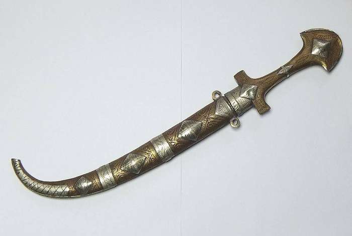 A large vintage Turkish dagger with detailed sheath in display condition
