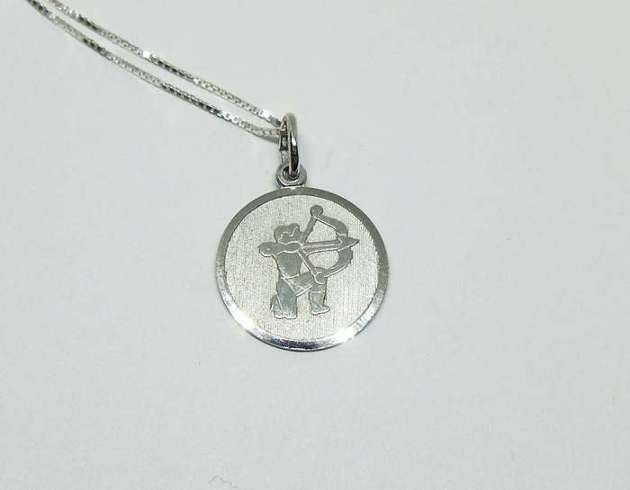 A vintage sterling silver Sagittarius Zodiac sign pendant with a sterling silver necklace