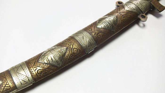 A large vintage Turkish dagger with detailed sheath in display condition