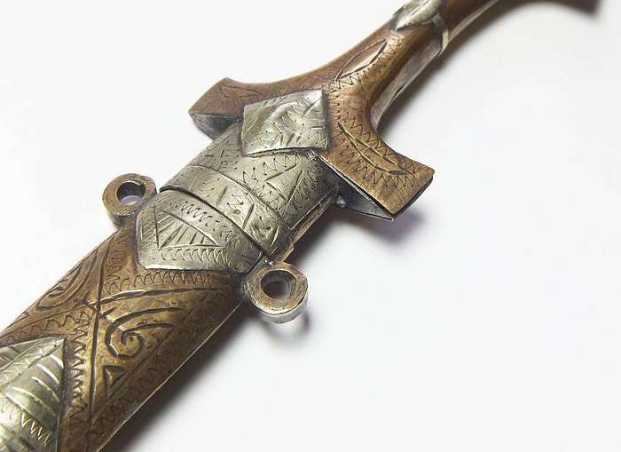 A large vintage Turkish dagger with detailed sheath in display condition